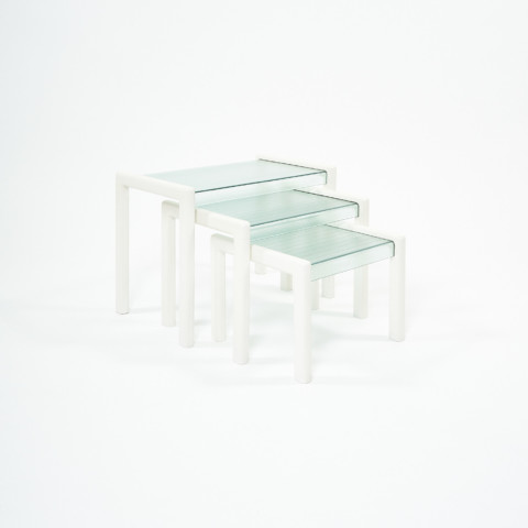 FROSTED glass nesting tables
